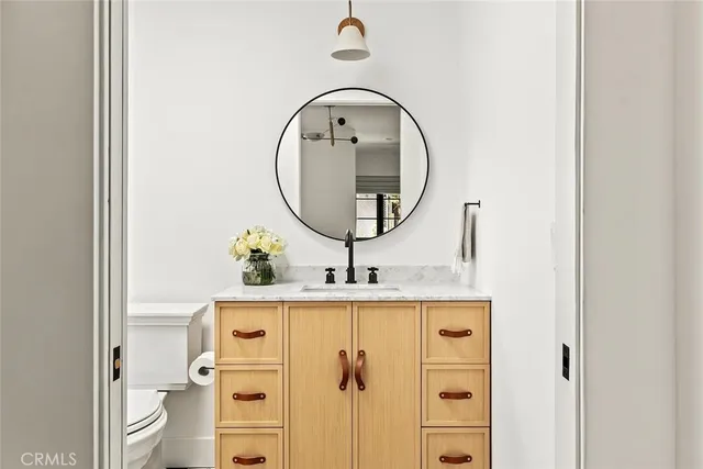a view of a hallway with washer and dryer