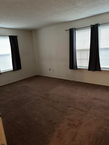 an empty room with window