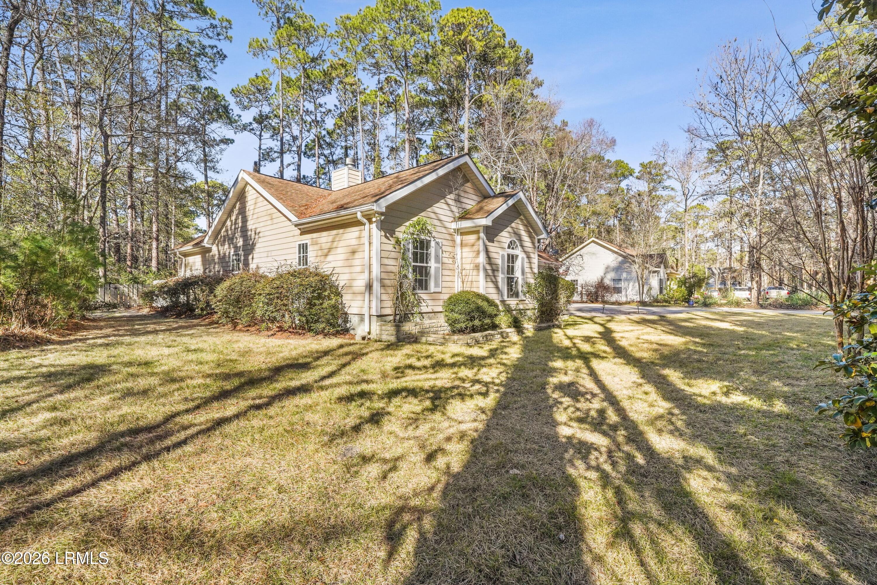 561 Sams Point Road Beaufort, SC 29907 - Photo 6 of 44 SIDE VIEW OF HOME