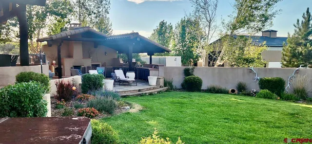 a view of a garden with potted plants
