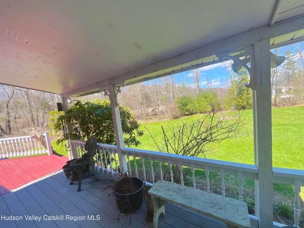 a view of a hallway with washer and dryer