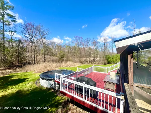 a kitchen with stainless steel appliances granite countertop a sink refrigerator and cabinets