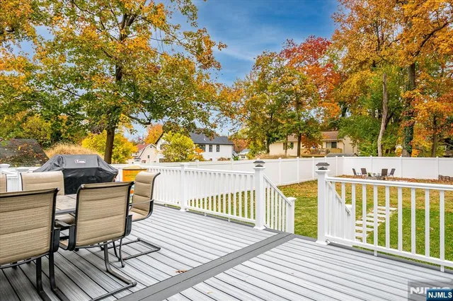 a view of a deck with chairs