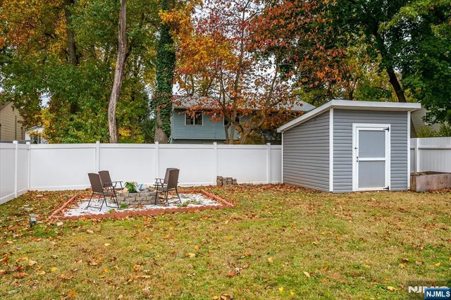 an aerial view of a house with a garden