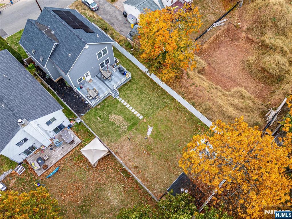 174 Manhattan Avenue Teaneck, NJ 07666 - Photo 40 of 45 an aerial view of a house with a yard