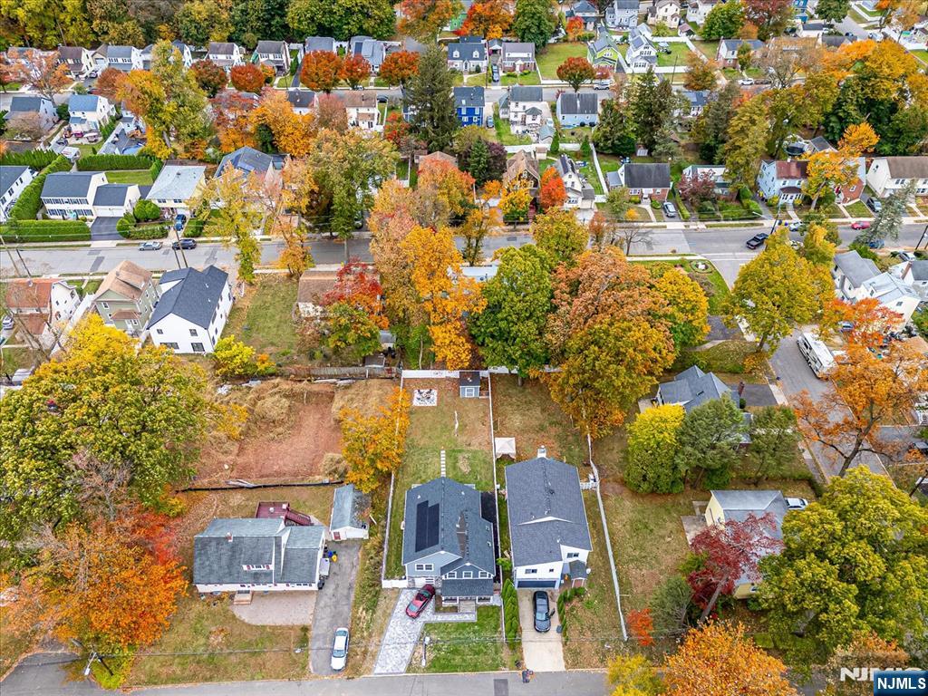 174 Manhattan Avenue Teaneck, NJ 07666 - Photo 43 of 45 an aerial view of residential houses with outdoor space