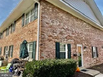 a brick building with a large windows