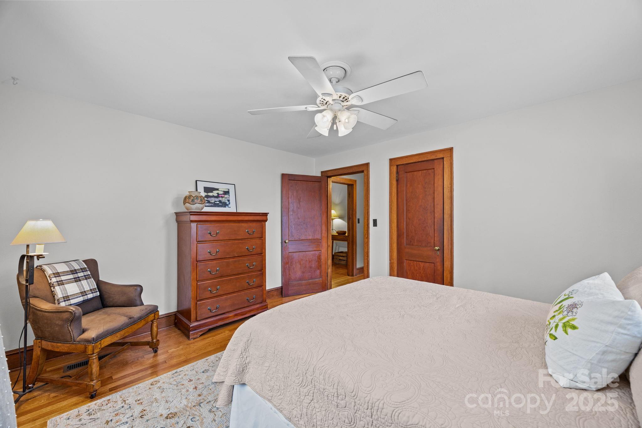 495 Fairview Road Asheville, NC 28803 - Photo 22 of 41 a bedroom with a bed and furniture