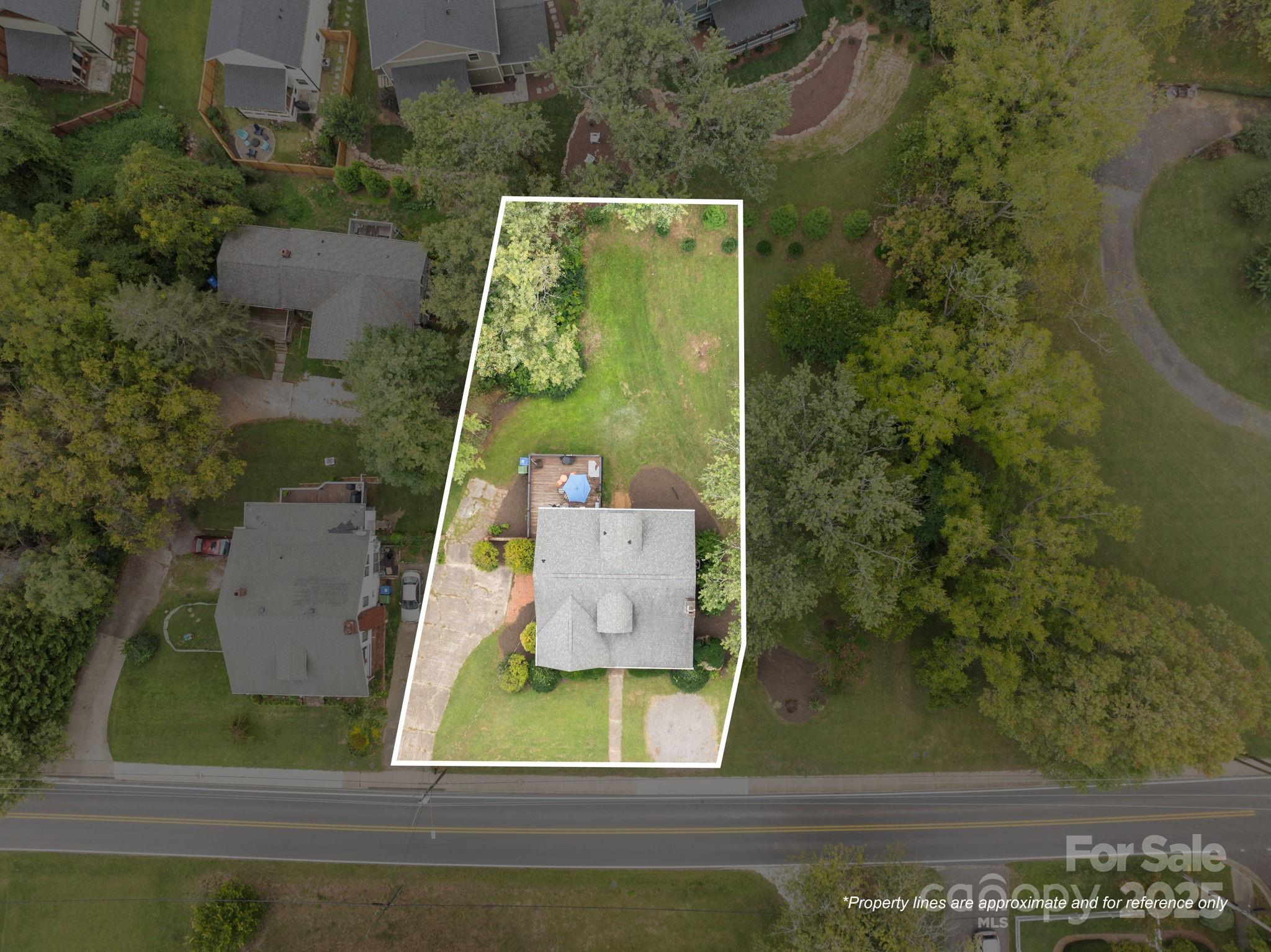495 Fairview Road Asheville, NC 28803 - Photo 41 of 41 an aerial view of a residential houses with outdoor space