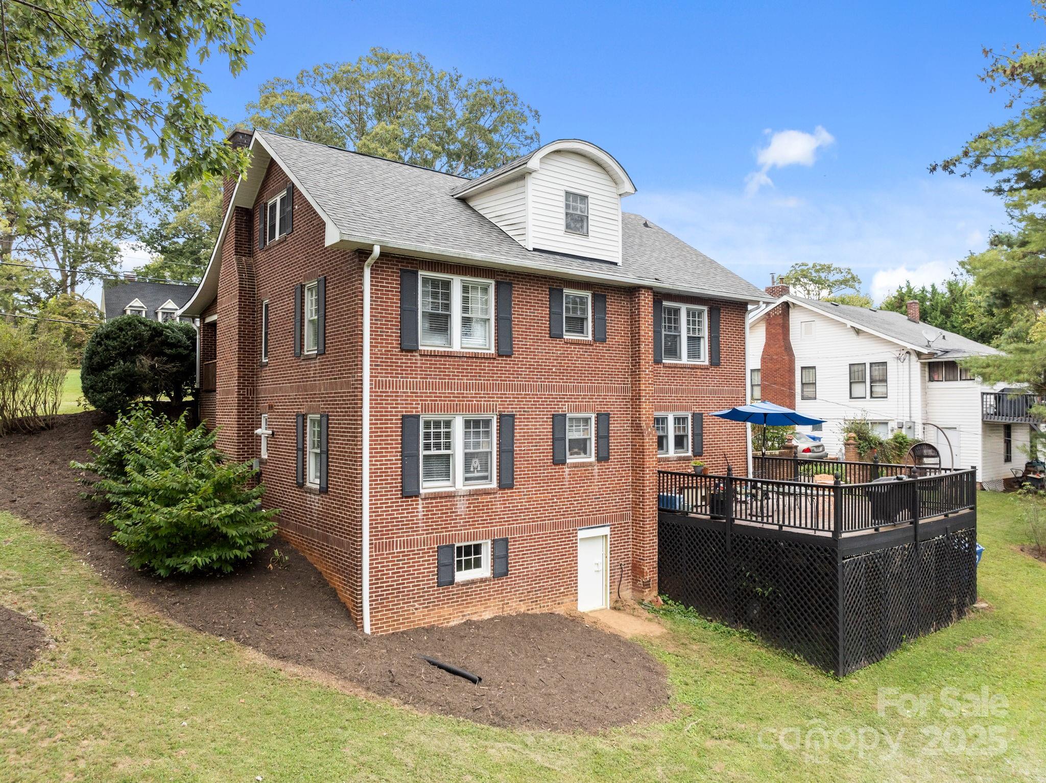 495 Fairview Road Asheville, NC 28803 - Photo 8 of 41 a front view of house with yard
