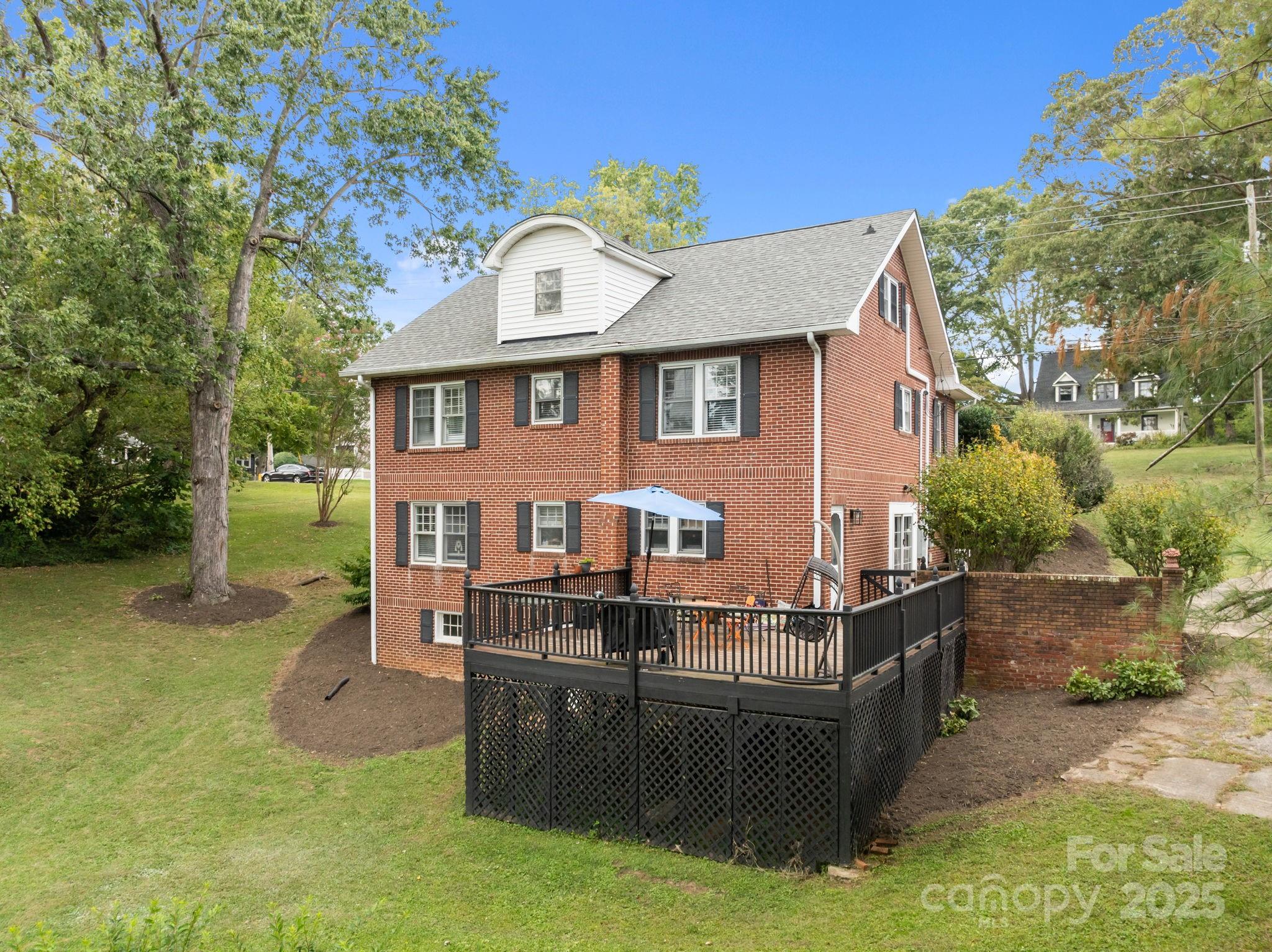 495 Fairview Road Asheville, NC 28803 - Photo 9 of 41 a front view of house with yard