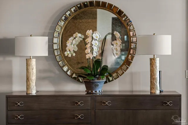 wooden floor with a vase of flowers on it