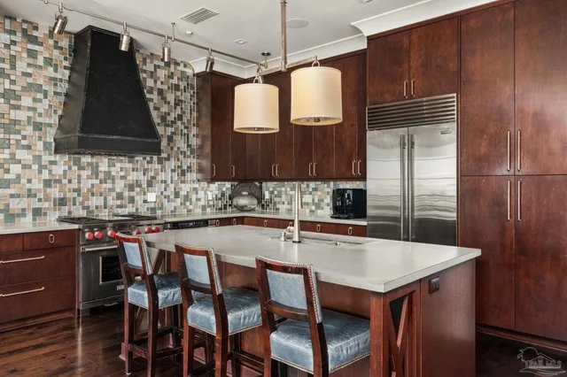 a kitchen with a table and chairs in it