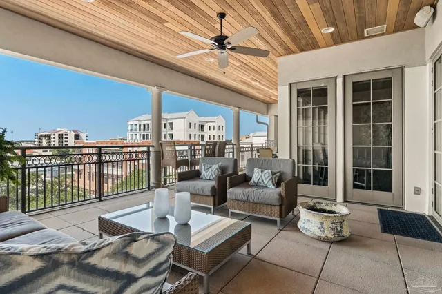 a outdoor space with patio the couches and a potted plant on the table