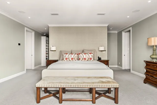 a bathroom with a granite countertop sink a mirror and a shower