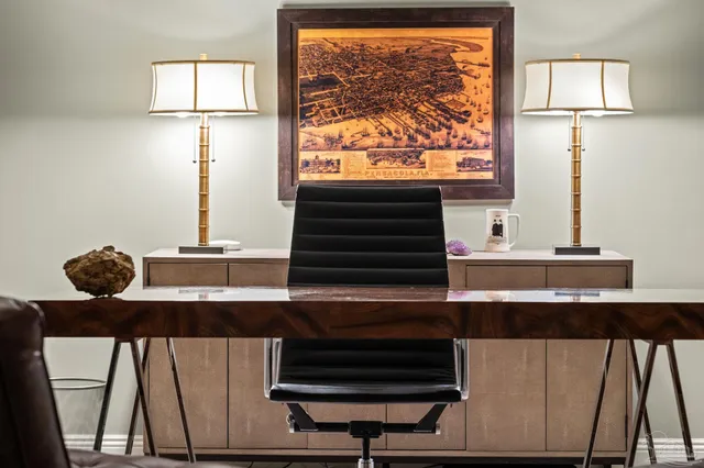 a bedroom with a bed and a couch