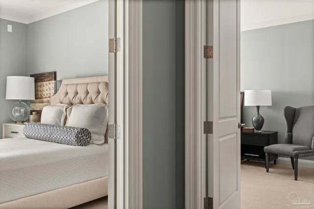 a living room with a couch and dresser