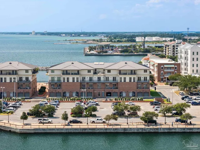 a view of a large building with a swimming pool