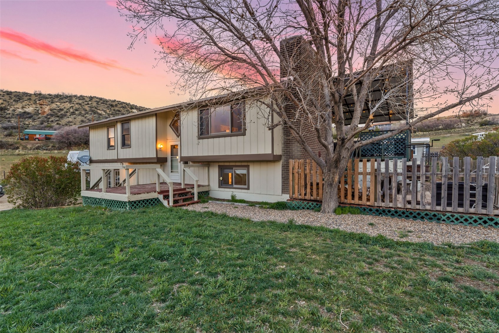 224 C R 206 Craig, CO 81625 - Photo 1 of 50 a view of a house with a yard