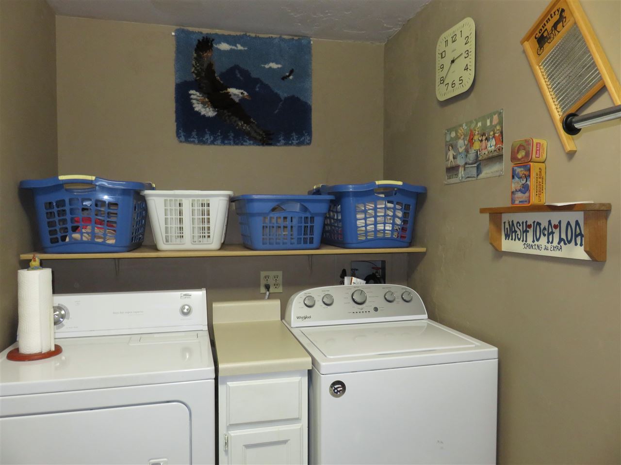 8766 Lovesee Road Roscoe, IL 61073 - Photo 15 of 27 a utility room with dryer and washer