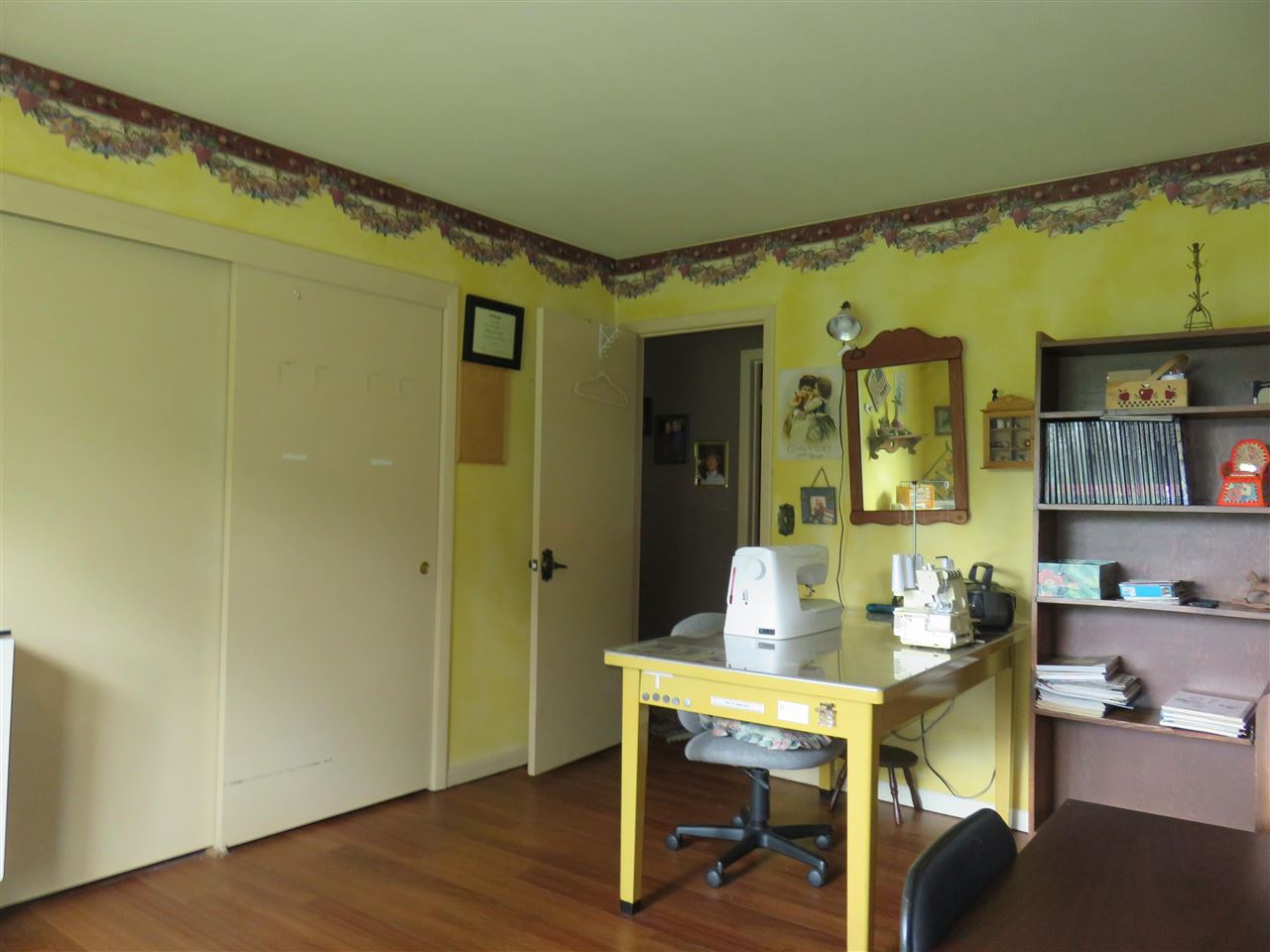 8766 Lovesee Road Roscoe, IL 61073 - Photo 23 of 27 a workspace with furniture and wooden floor