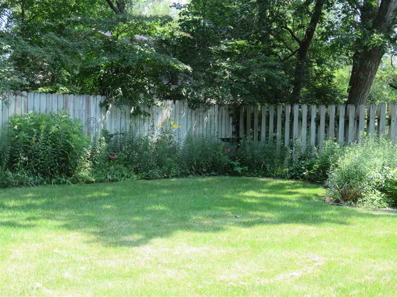 8766 Lovesee Road Roscoe, IL 61073 - Photo 5 of 27 a view of a garden
