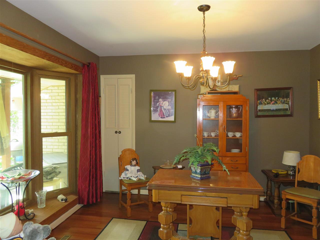 8766 Lovesee Road Roscoe, IL 61073 - Photo 8 of 27 a dining room with furniture and window