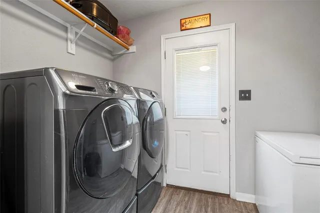 a utility room with dryer and washer
