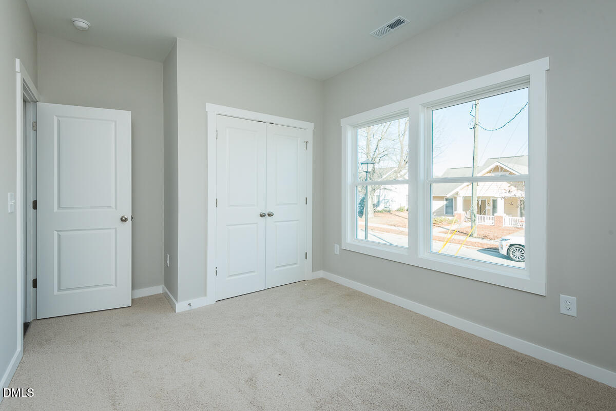 555 Pinnix Road Burlington, NC 27217 - Photo 17 of 20 a view of an empty room with a window