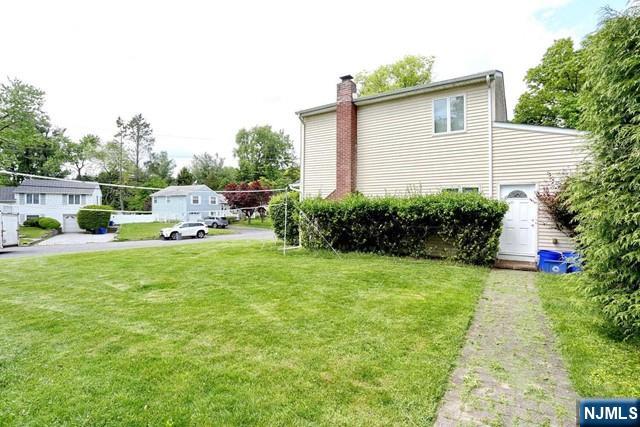 84 12th Street Cresskill, NJ 07626 - Photo 43 of 45 a view of backyard of house with green space
