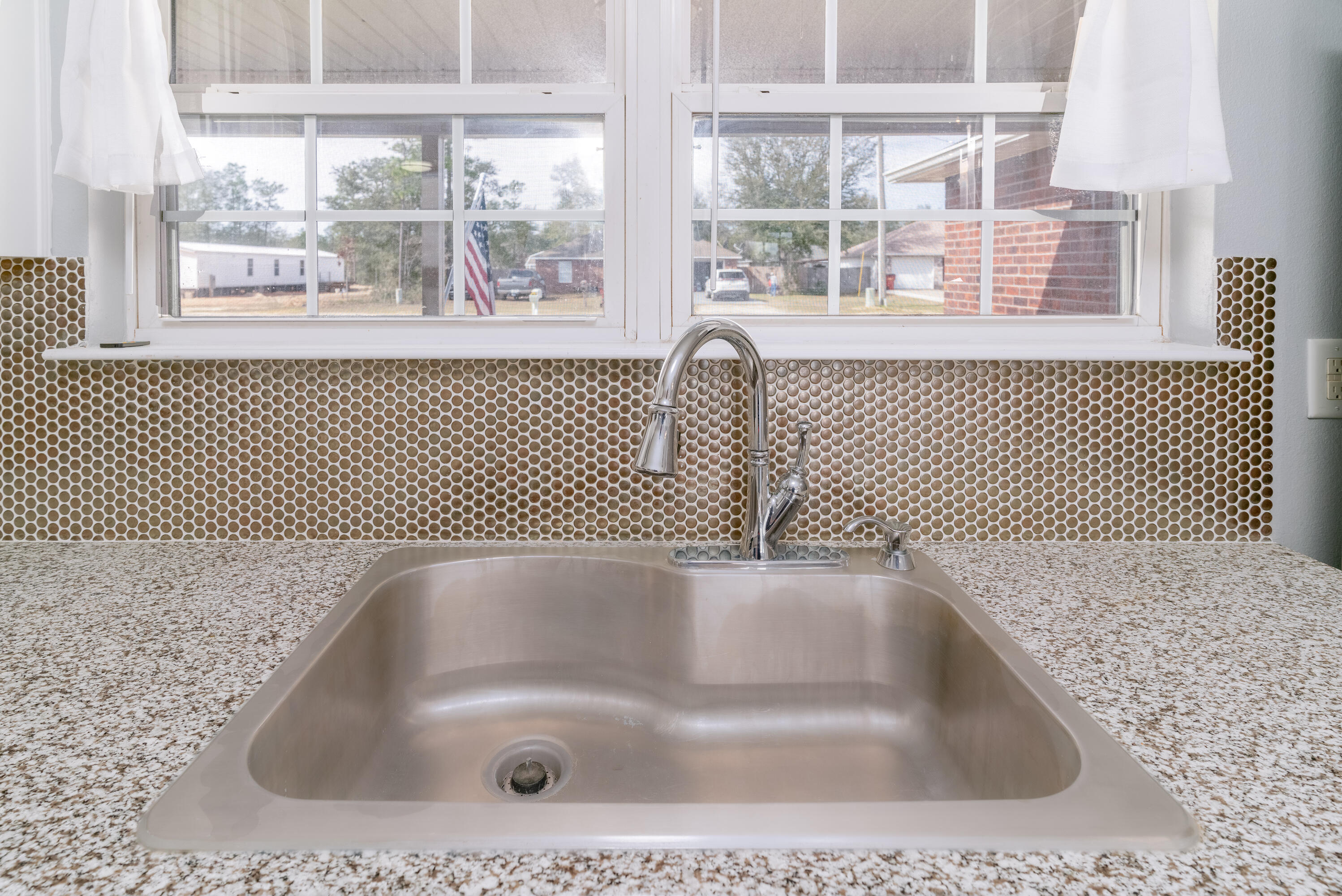5191 Quince Avenue Crestview, FL 32539 - Photo 12 of 45 a bath tub sitting next to a window