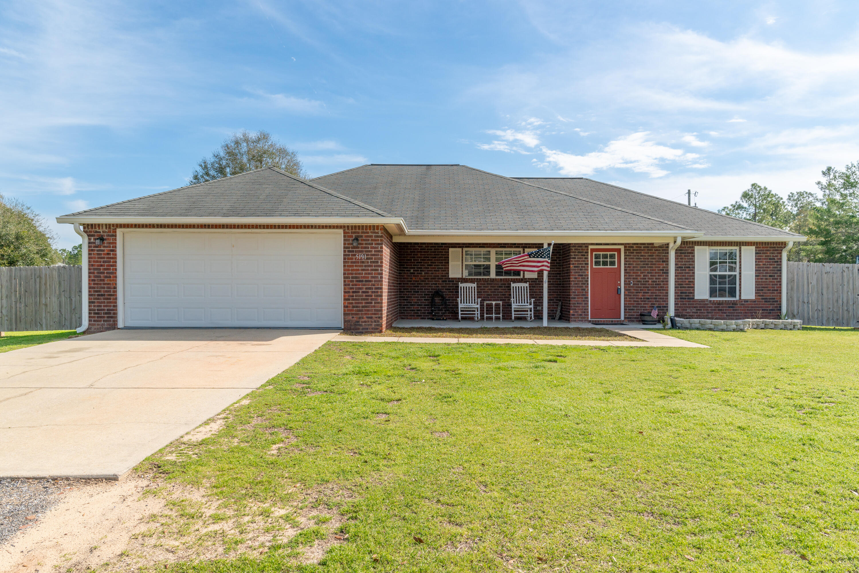 5191 Quince Avenue Crestview, FL 32539 - Photo 2 of 45 front view of a house with a yard
