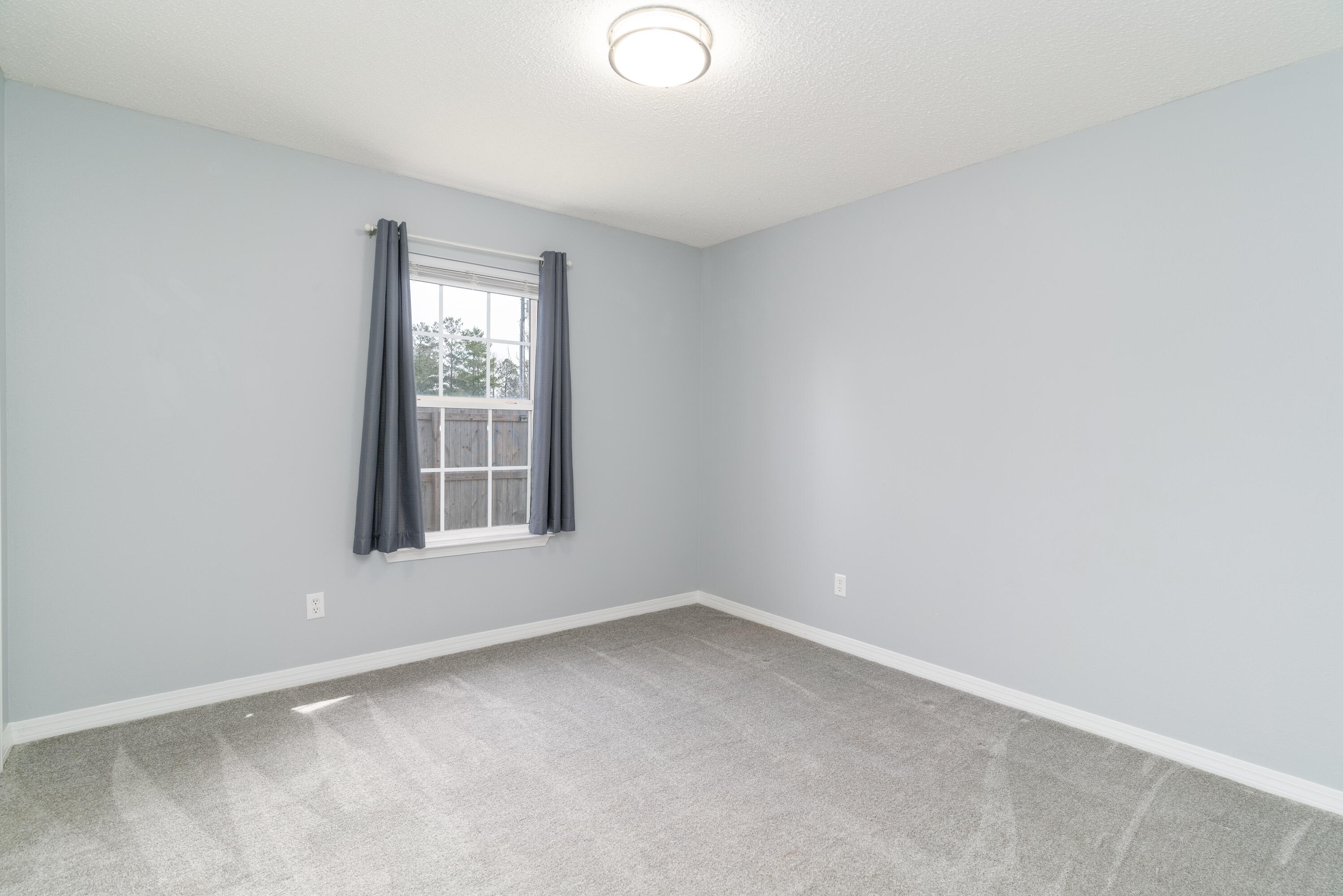 5191 Quince Avenue Crestview, FL 32539 - Photo 25 of 45 an empty room with a window