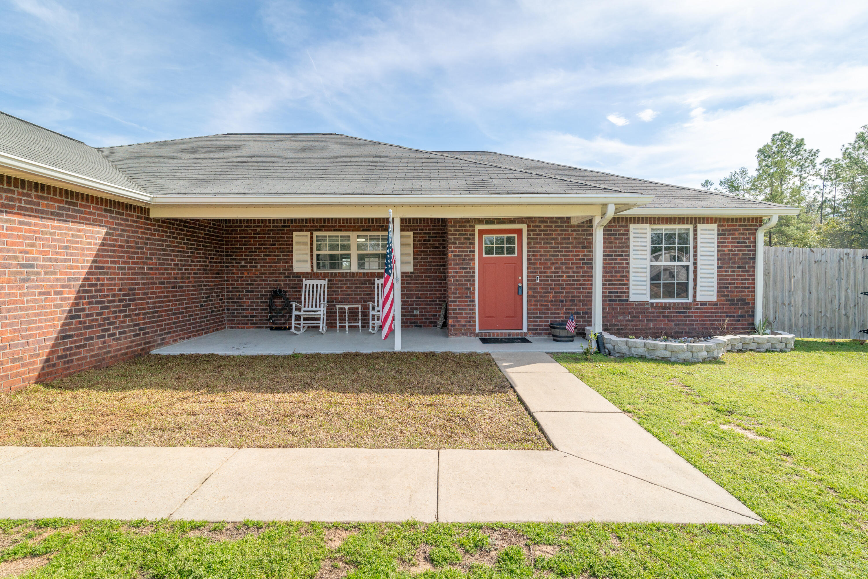 5191 Quince Avenue Crestview, FL 32539 - Photo 4 of 45 a view of a house with swimming pool and sitting area