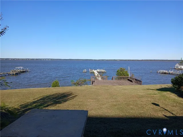 a view of a swimming pool with an ocean view