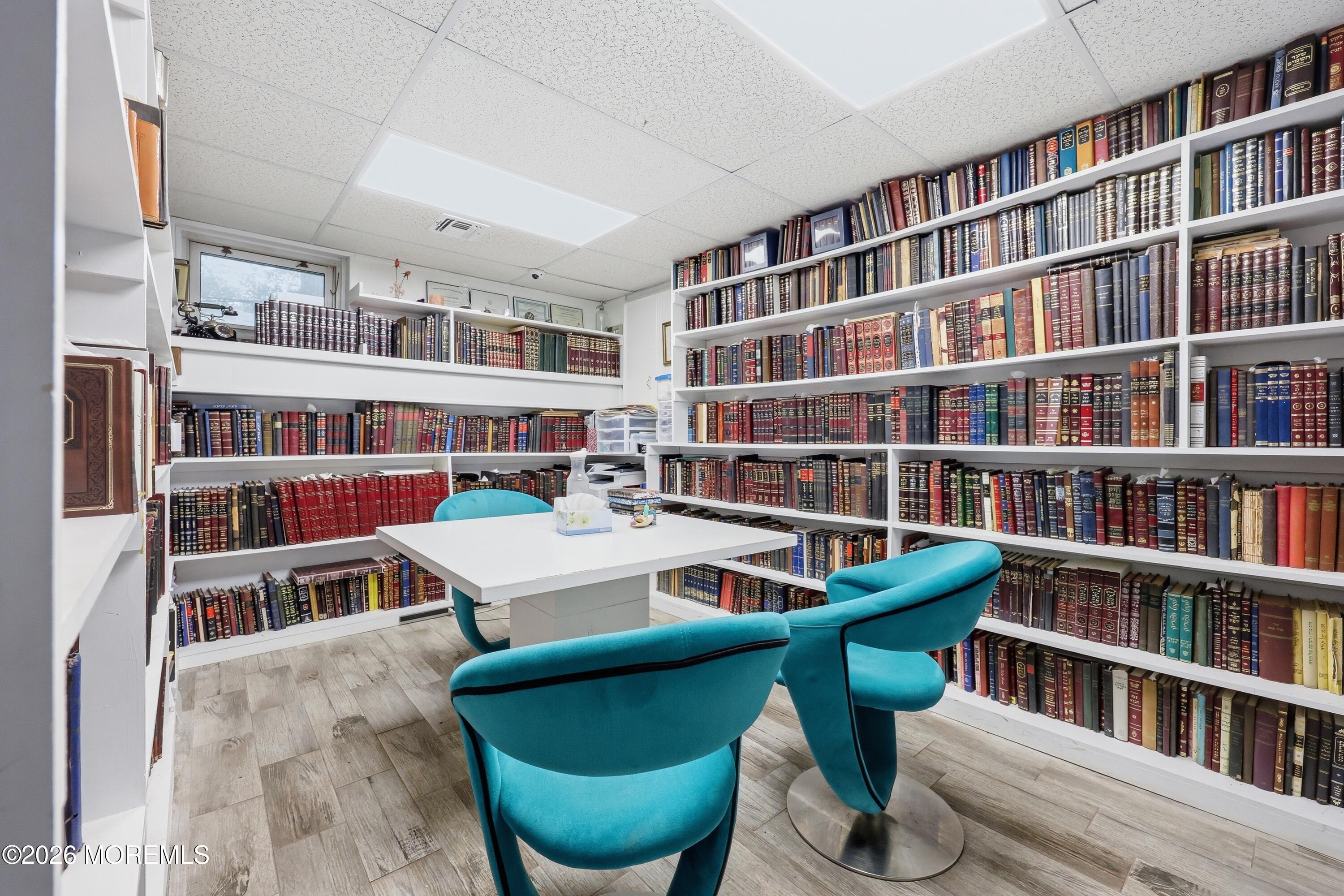 1845 Old Freehold Road Toms River, NJ 08755 - Photo 12 of 27 a work room with furniture and a book shelf