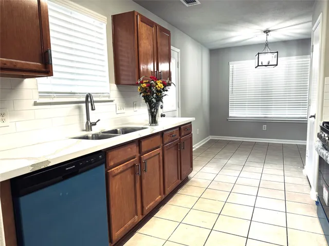 a bathroom with a sink a vanity and a mirror
