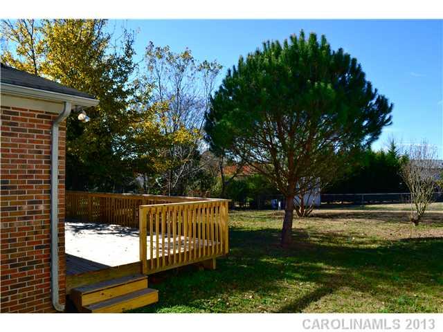 3417 Sandy Porter Road Charlotte, NC 28273 - Photo 4 of 12 a view of a backyard with a garden