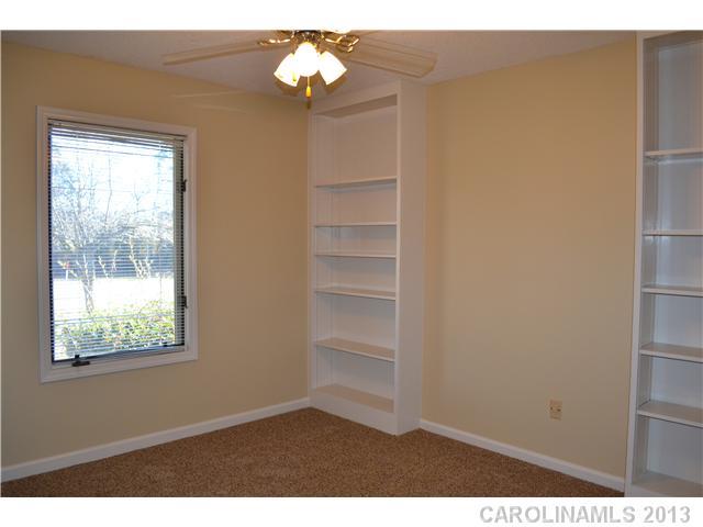 3417 Sandy Porter Road Charlotte, NC 28273 - Photo 10 of 12 a view of an empty room with a window
