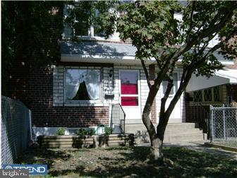 a view of house with tree s