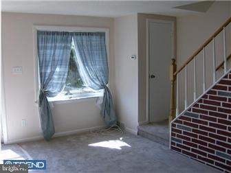 987 Grant Road Folcroft, PA 19032 - Photo 6 of 12 a view of room with stairs and ventilation