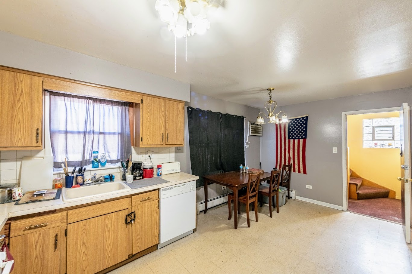 1619 35th Avenue Melrose Park, IL 60160 - Photo 13 of 35 a kitchen with sink cabinets and window