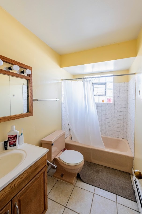 1619 35th Avenue Melrose Park, IL 60160 - Photo 15 of 35 a bathroom with a sink toilet and shower