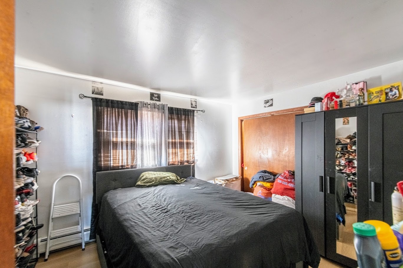 1619 35th Avenue Melrose Park, IL 60160 - Photo 22 of 35 a bedroom with a bed and a window