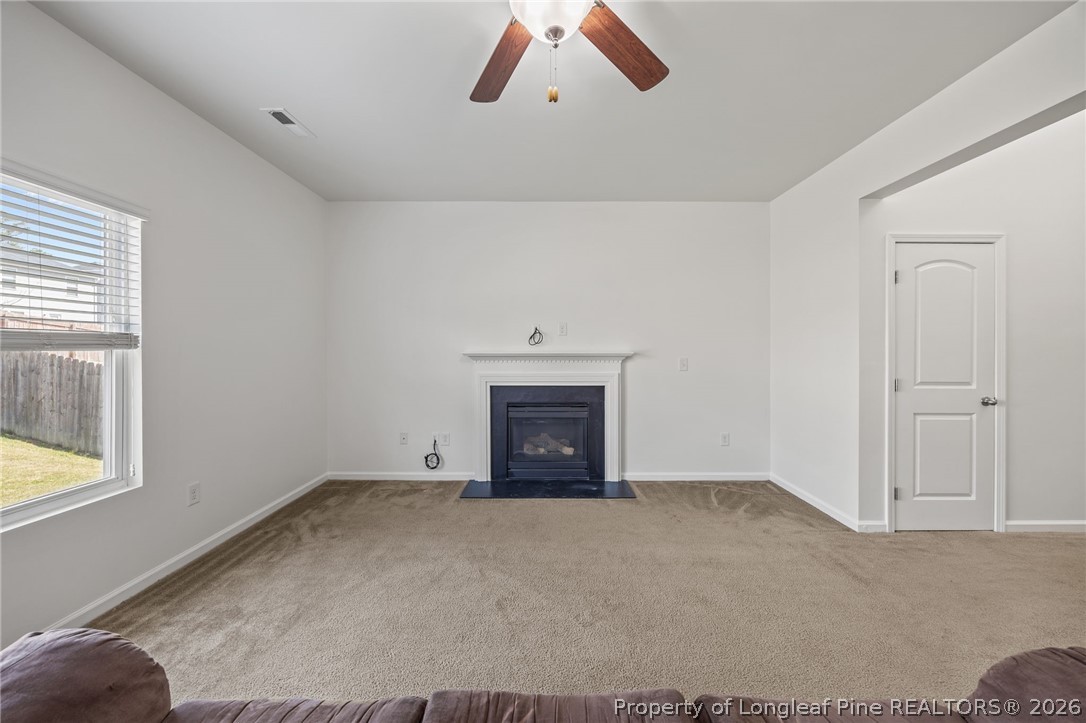 226 River Oak Street Spring Lake, NC 28390 - Photo 11 of 41 a view of an empty room with a fireplace