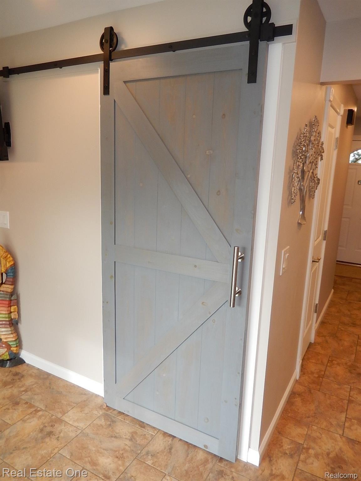 950 Cobblers Road Waterford, MI 48327 - Photo 9 of 29 Pantry with Barn Door.JPG
