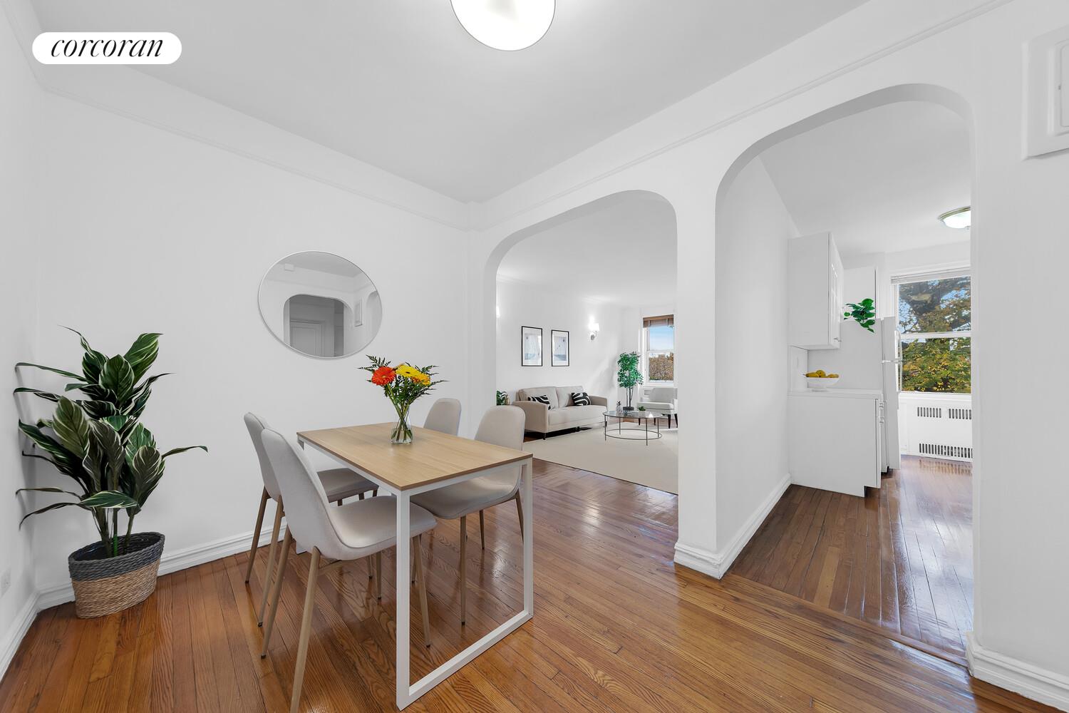 176 Seeley Street, Unit A7 Brooklyn, NY 11218 - Photo 3 of 7 a workspace with furniture and wooden floor