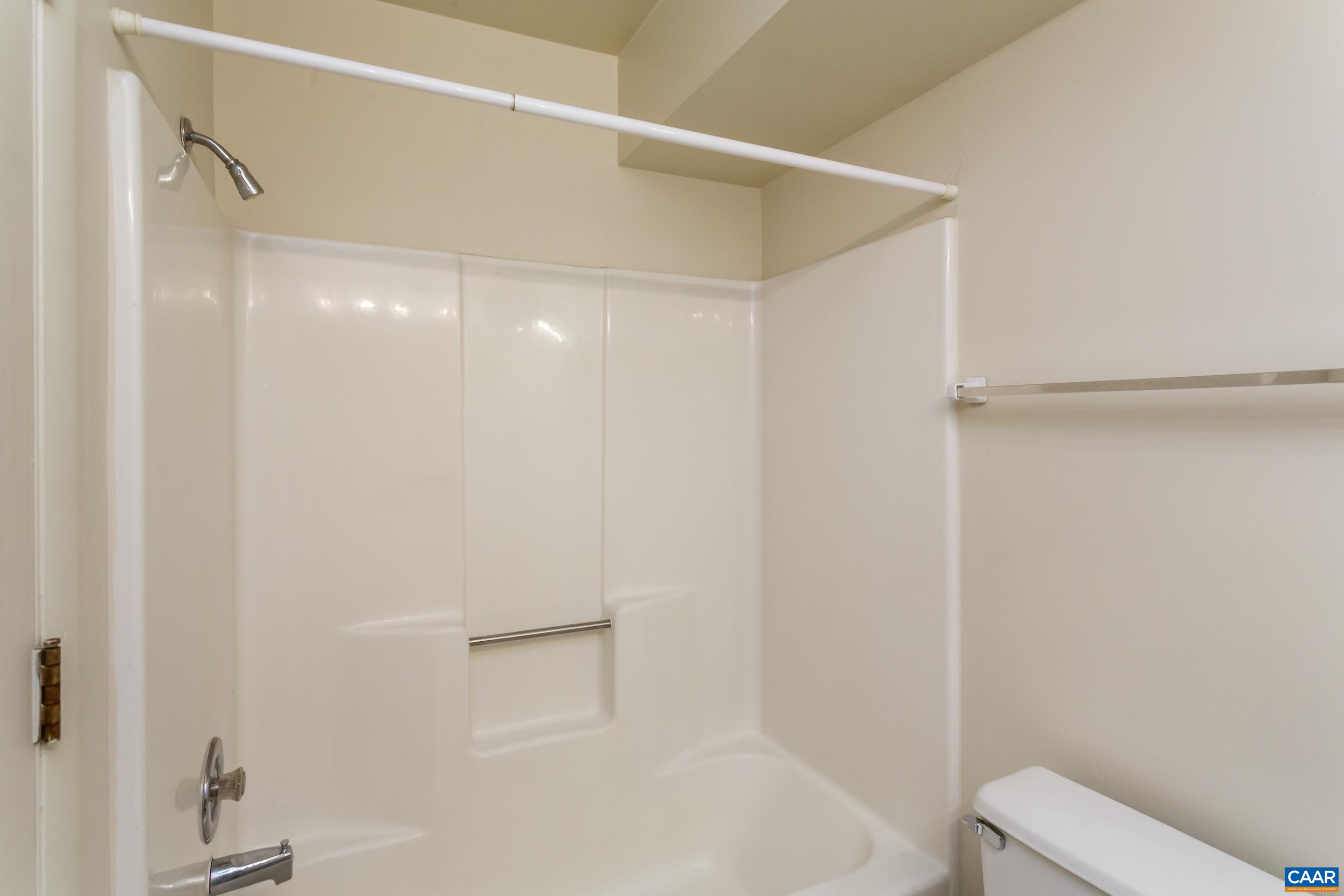 115 Turtle Creek Road, Unit 11 Charlottesville, VA 22901 - Photo 12 of 15 a bathroom with a shower and a toilet