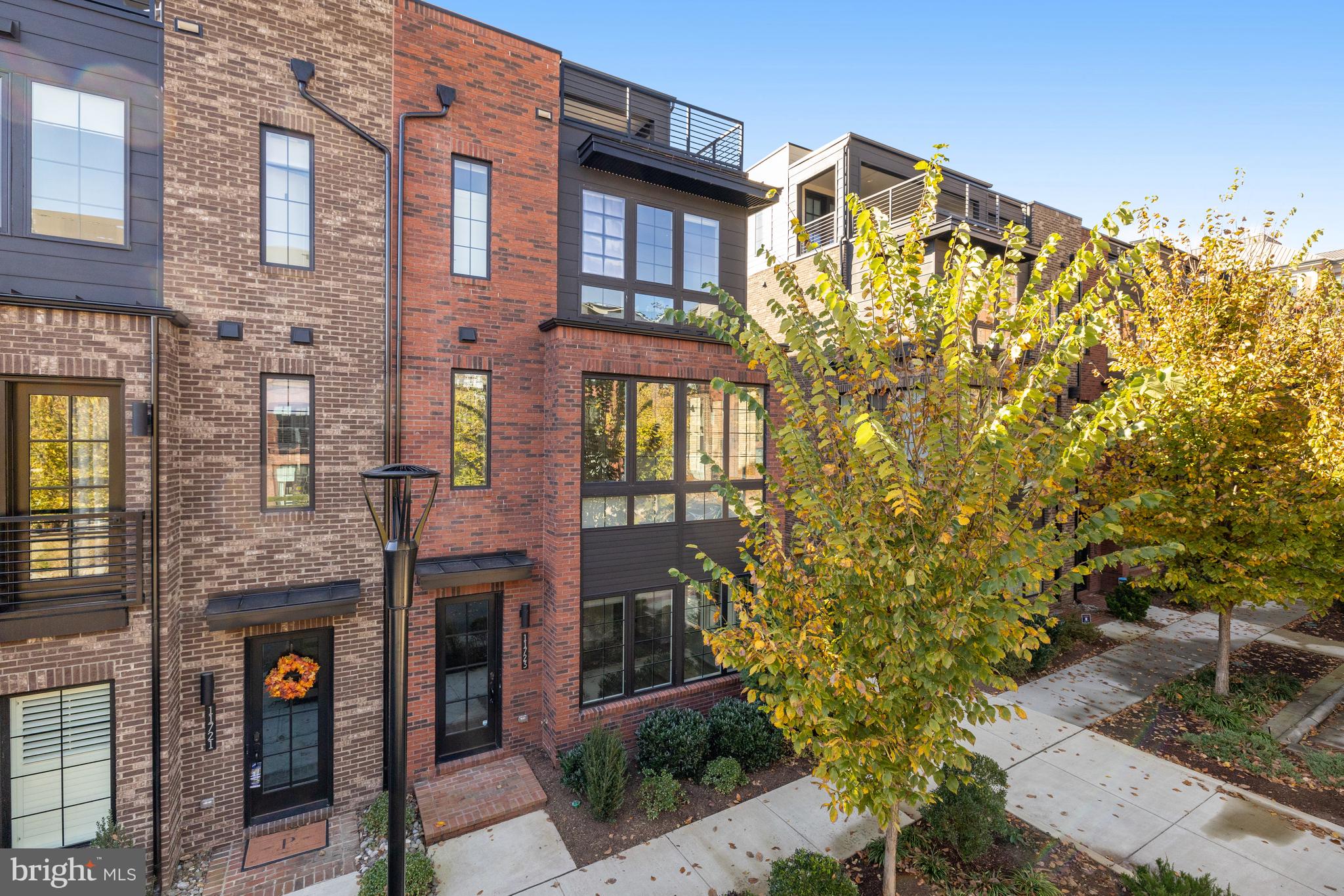 11723 Paysons Way Reston, VA 20191 - Photo 2 of 51 a front view of a multi story residential apartment building