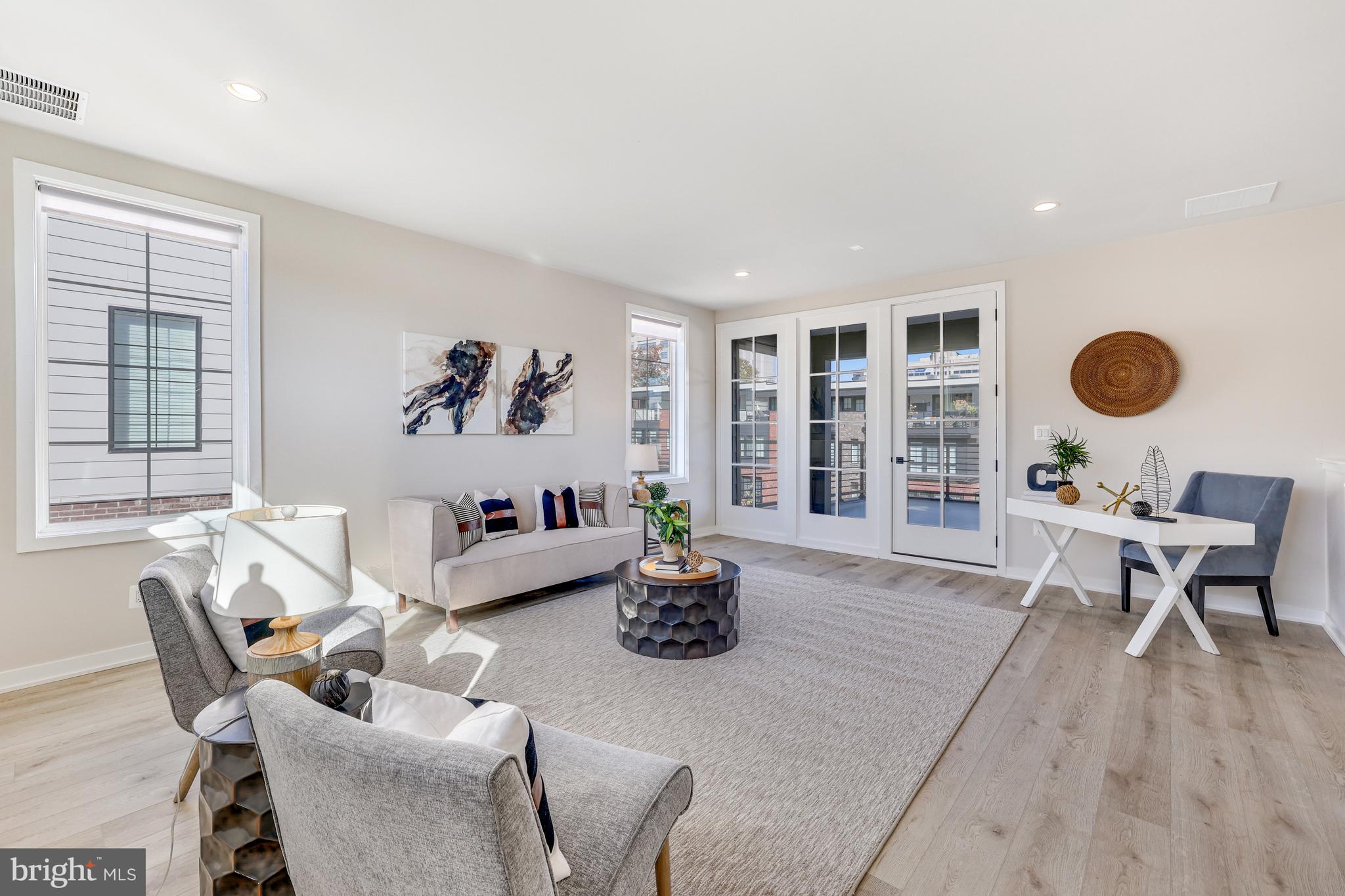 11723 Paysons Way Reston, VA 20191 - Photo 29 of 51 a living room with furniture and wooden floor